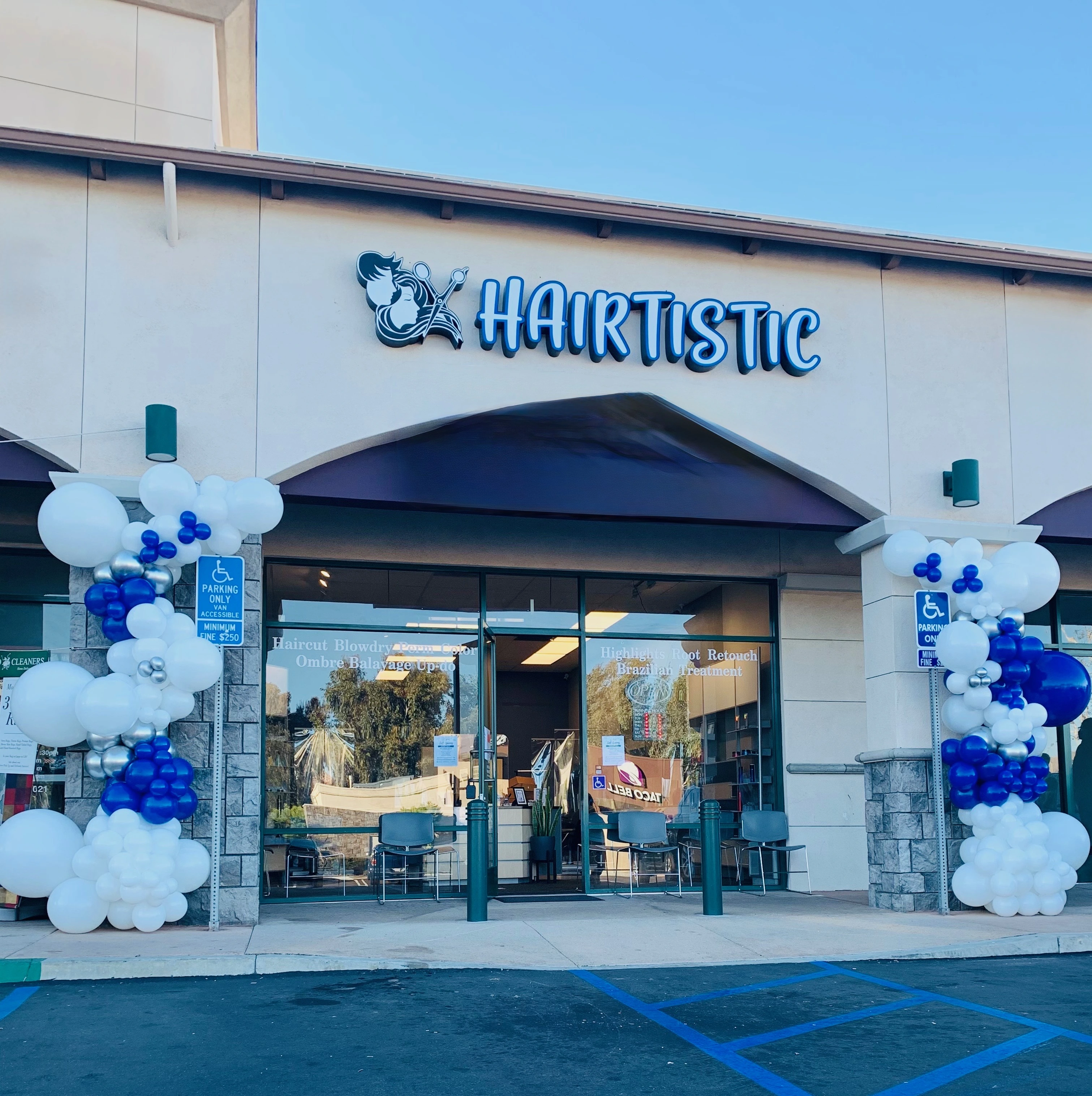 Modern hair salon interior at Hairtistic RSM in Rancho Santa Margarita with professional styling stations